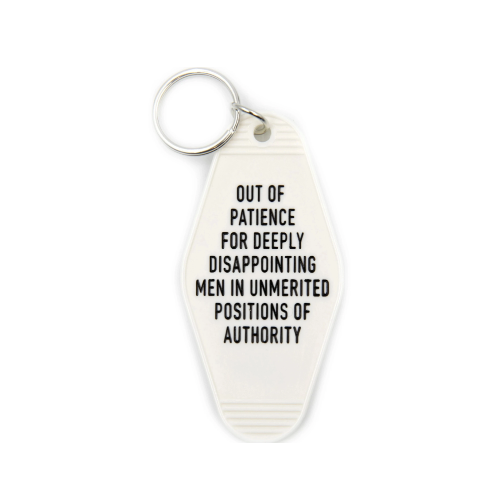 Colorful keychain featuring a witty saying for women.