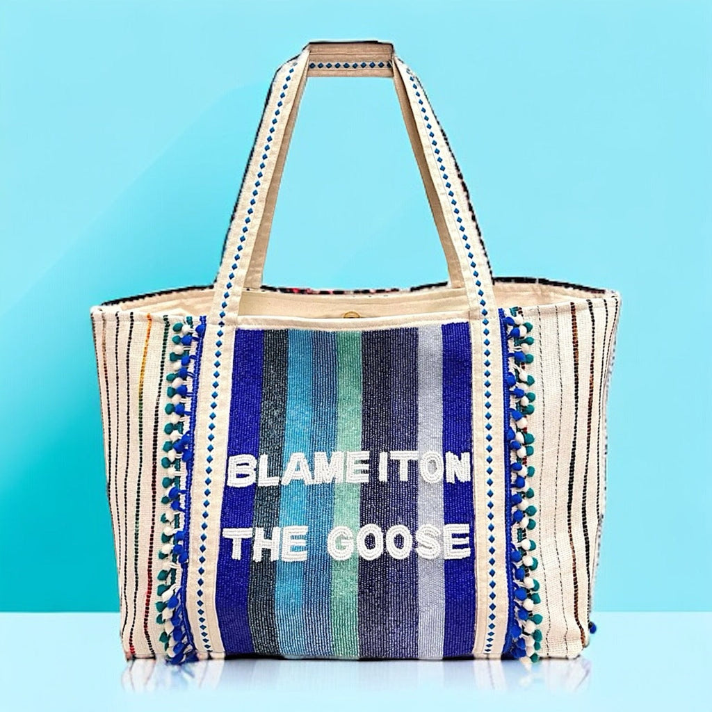 Stylish and versatile geometric pattern tote bag with a fun and unique goose design, perfect for everyday use or special occasions.
