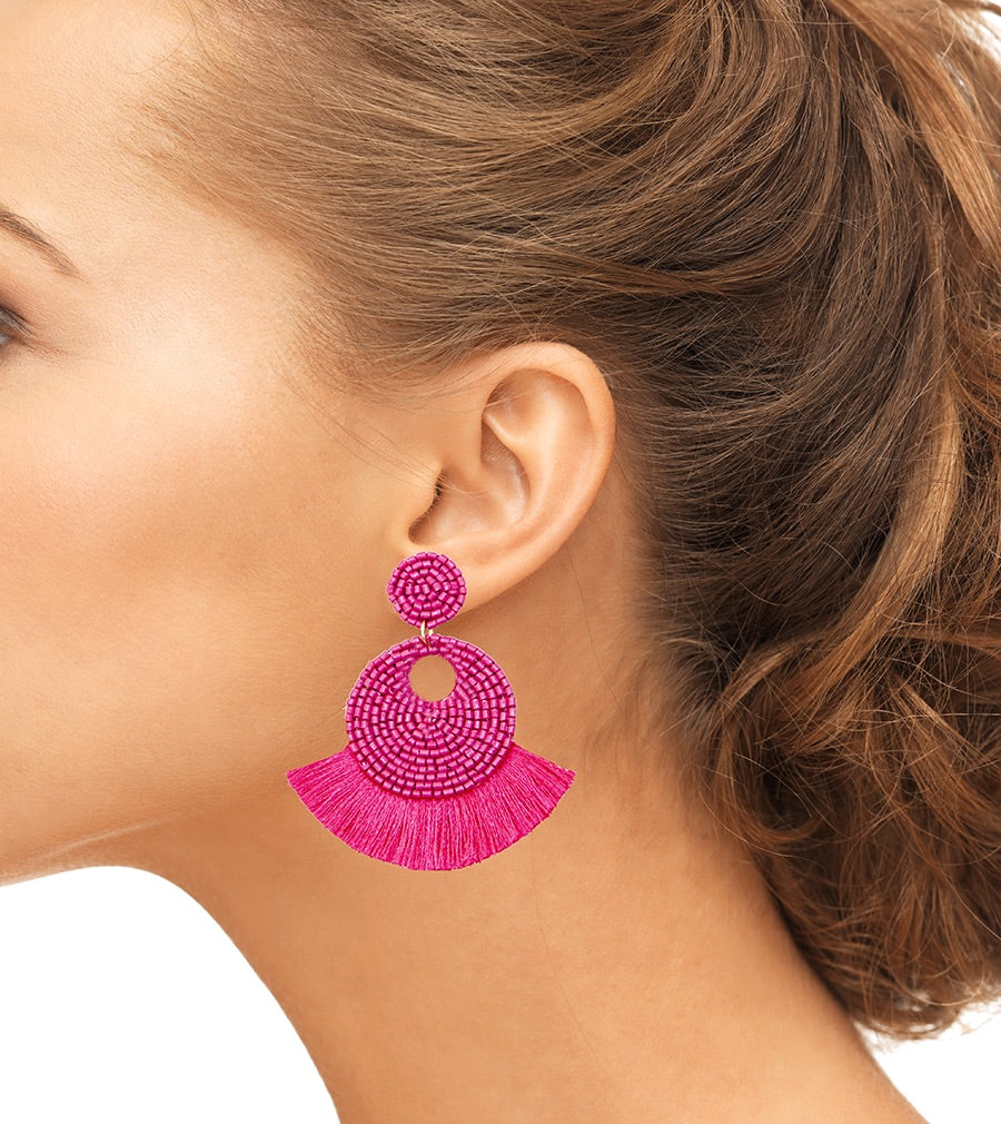 Fuchsia beaded earrings with bold fringe and a "Not Today" patch, designed for a playful and stylish statement.