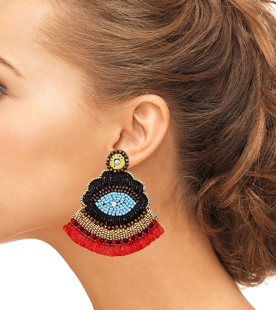 Bold and vibrant red earrings featuring beaded details, fringe, and "BOSS" patch, ideal for making a statement.