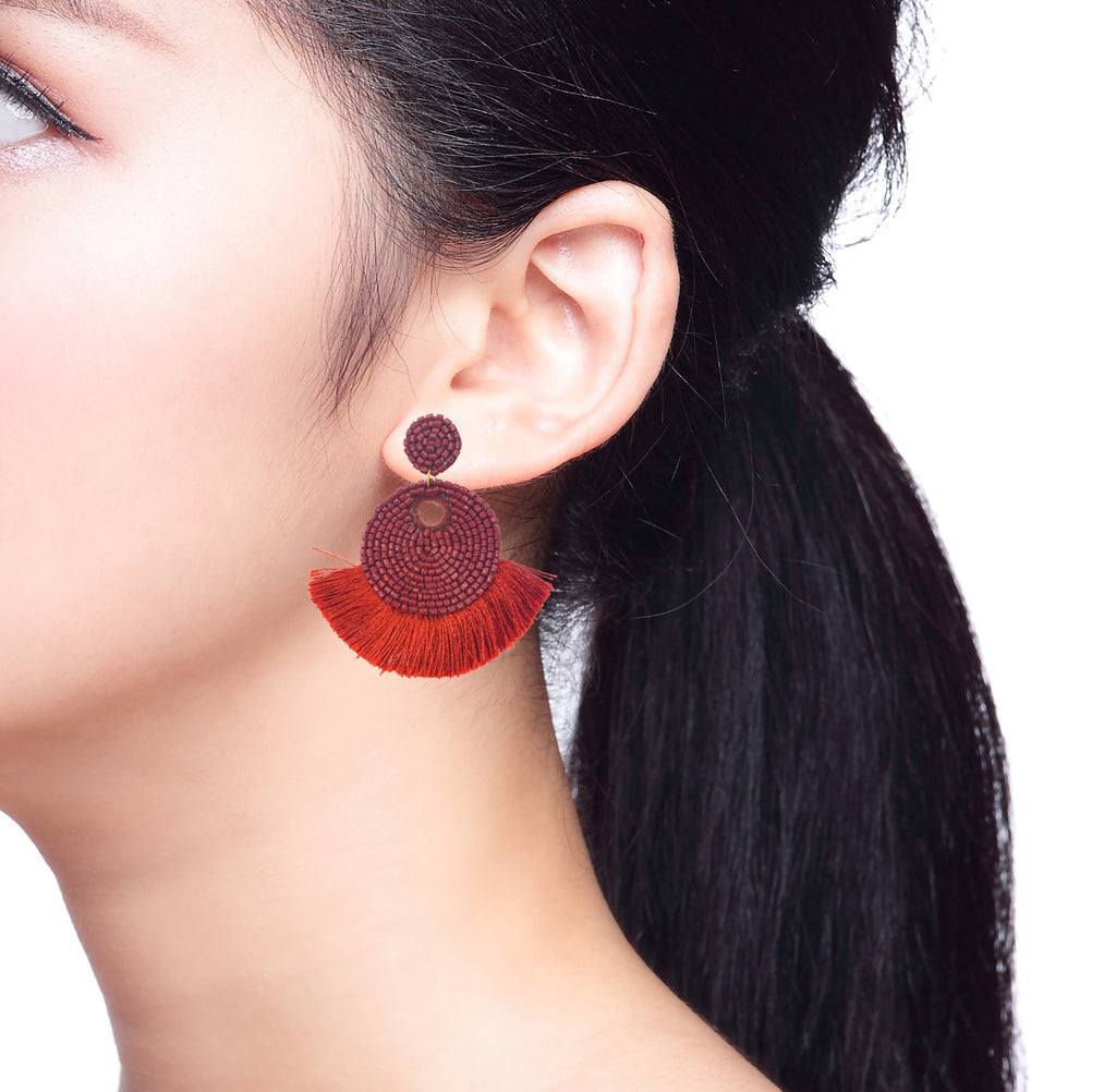 Fringe Benefits Petit Burgundy Earrings with a unique Super Freak design, lightweight and perfect for adding flair to any outfit.