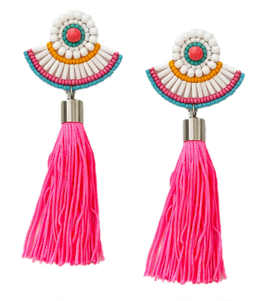 Tickled Pink Tassel Earrings featuring long pink tassels and a unique WTF patch, ideal for a bold fashion statement.