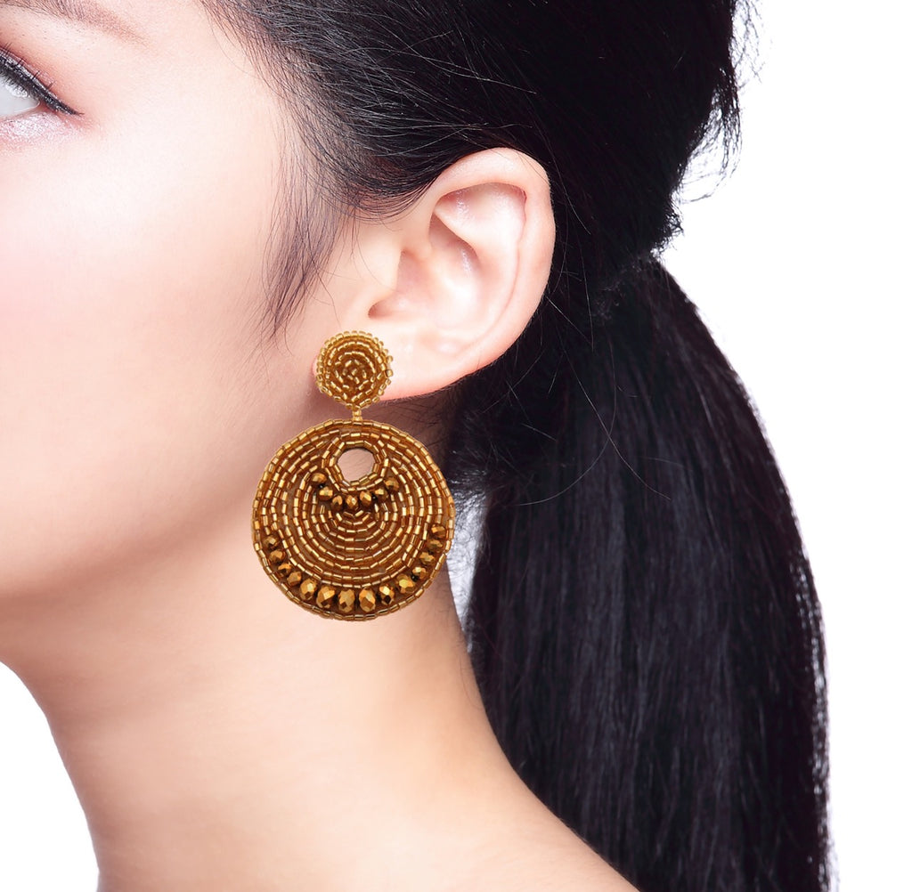 Elegant Aurum Gold Earrings with shimmering gold beads and handcrafted details.