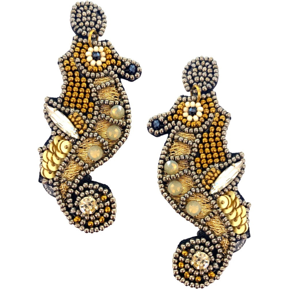 Unique beaded seahorse earrings with gold details, perfect for coastal-inspired fashion.