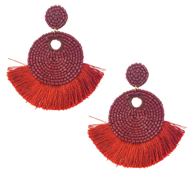 Lightweight burgundy earrings with a unique Super Freak patch and stylish fringe details, perfect for statement fashion.