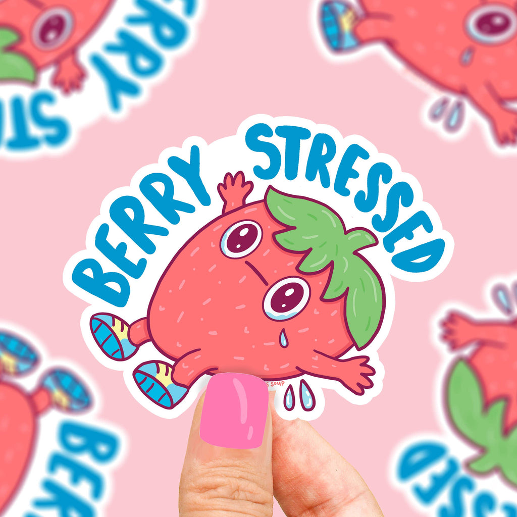 Colorful sticker featuring a playful strawberry character