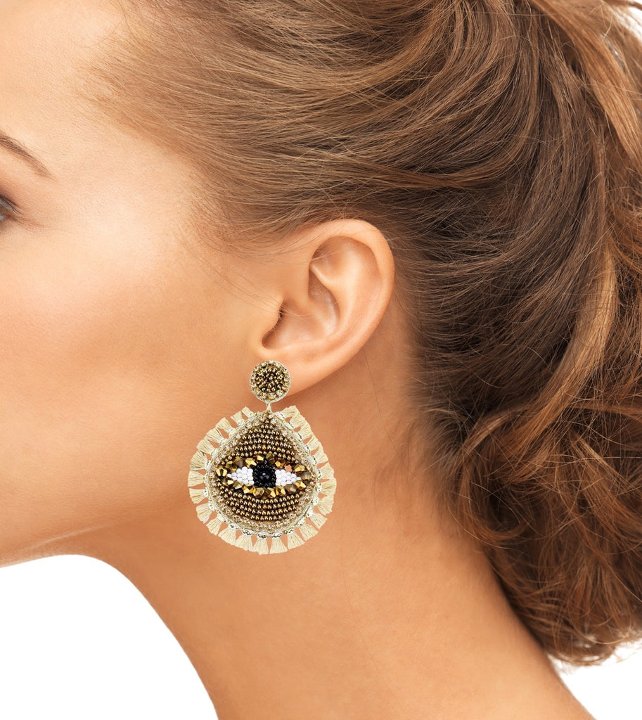 Unique evil eye gold earrings with playful "stop stalking me" patch.