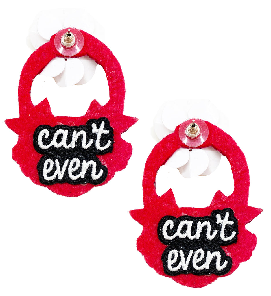 Statement earrings with magenta flowers and a "Can’t Even" patch, designed for comfort and style.