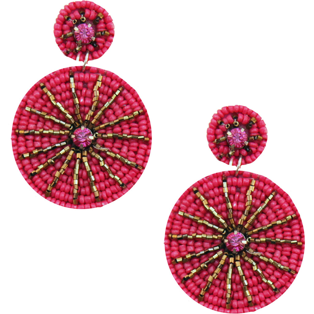 Vibrant fuchsia earrings with a fun starburst pattern and playful "Stay Wild" and lion patches.