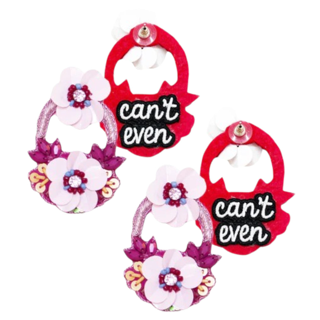 Vibrant magenta earrings with embroidered flowers and a "Can’t Even" patch design, perfect for adding a playful touch to any outfit.