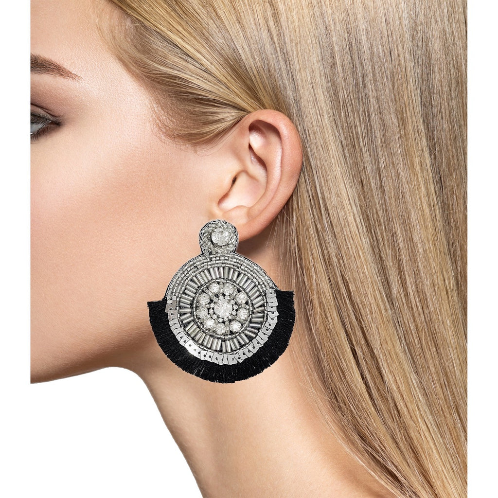 Stylish Good to Glow Silver Earrings with intricate beadwork, sparkly accents, and a fun "UGH" patch, designed for evening wear.