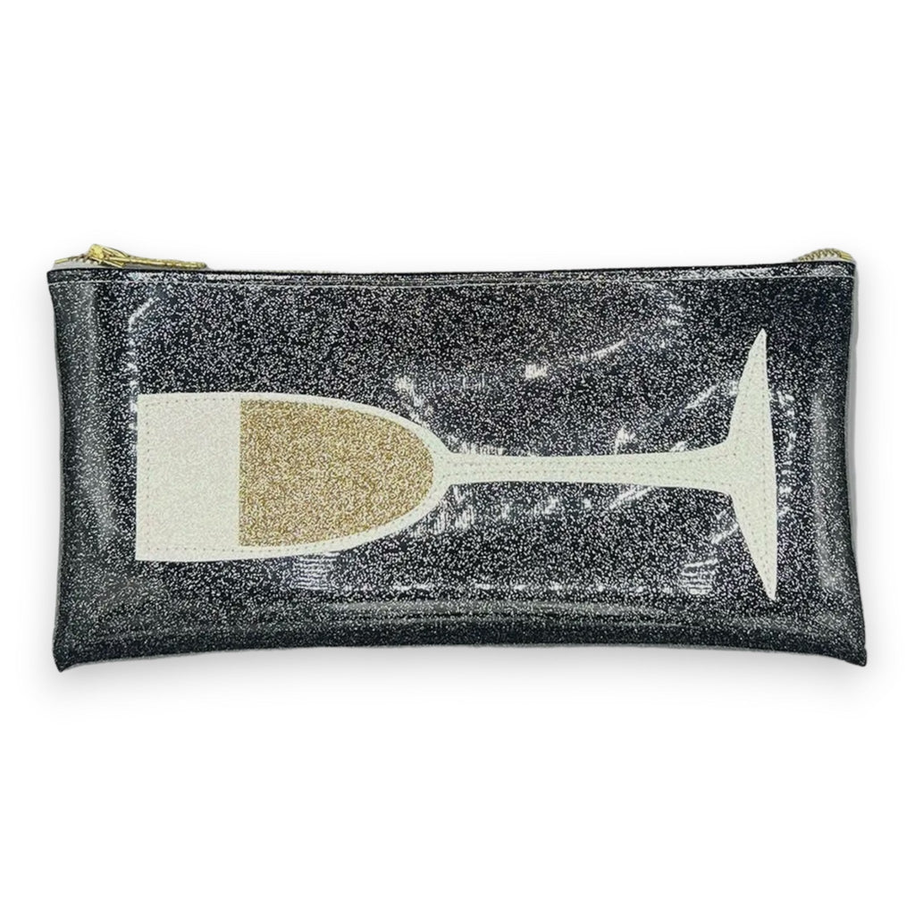 Shimmering black clutch with a spacious interior and magnetic closure, adorned with stunning glitter accents.