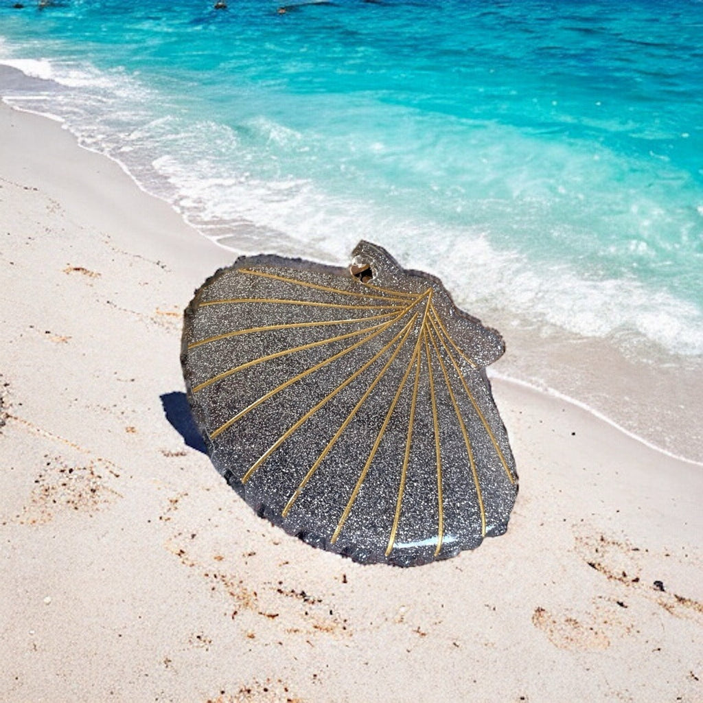 Shimmering gray glitter seashell hair clip adds pizzazz to any outfit
