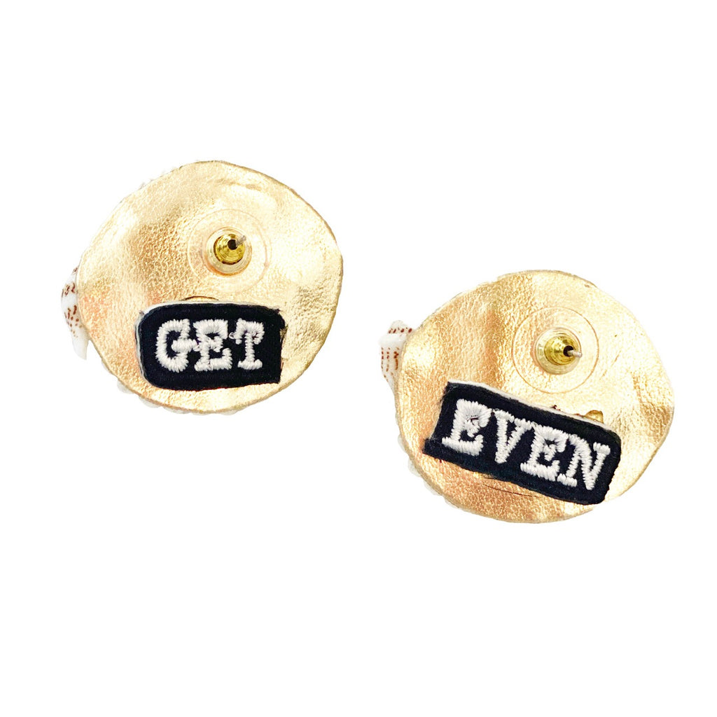 Handcrafted shell stud earrings with intricate gold detailing and unique "Get Even" patch design.