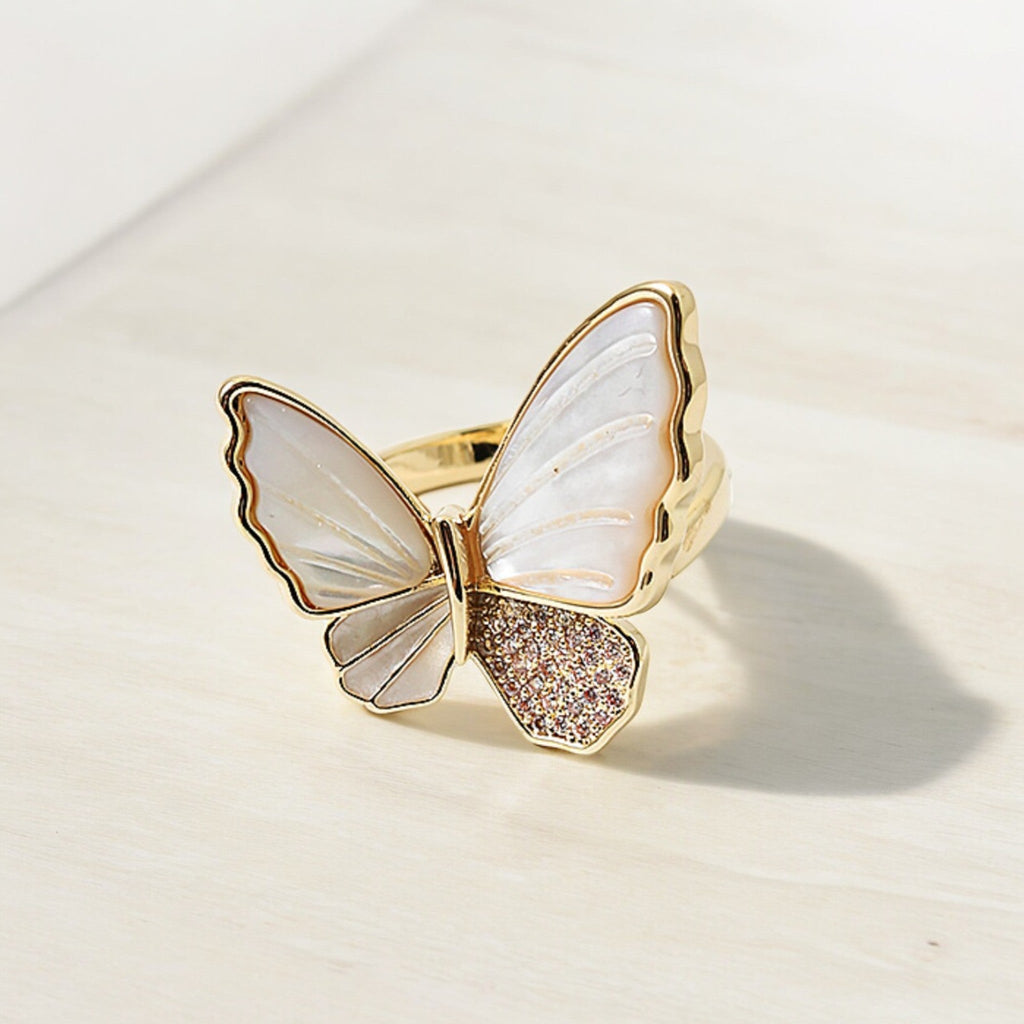 Sterling silver butterfly ring with an engravable nameplate. Perfect for everyday wear or as a personalized gift. (High Difficulty Keywords: Sterling Silver Ring, Engravable Ring)
