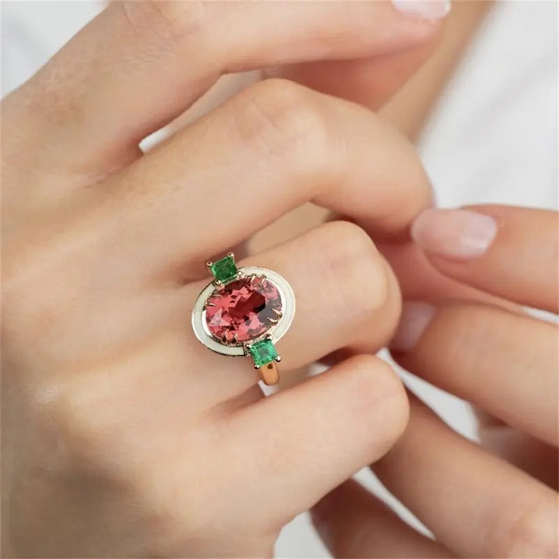 Affordable faux gemstone statement ring featuring rose tourmaline and emerald-inspired stones.