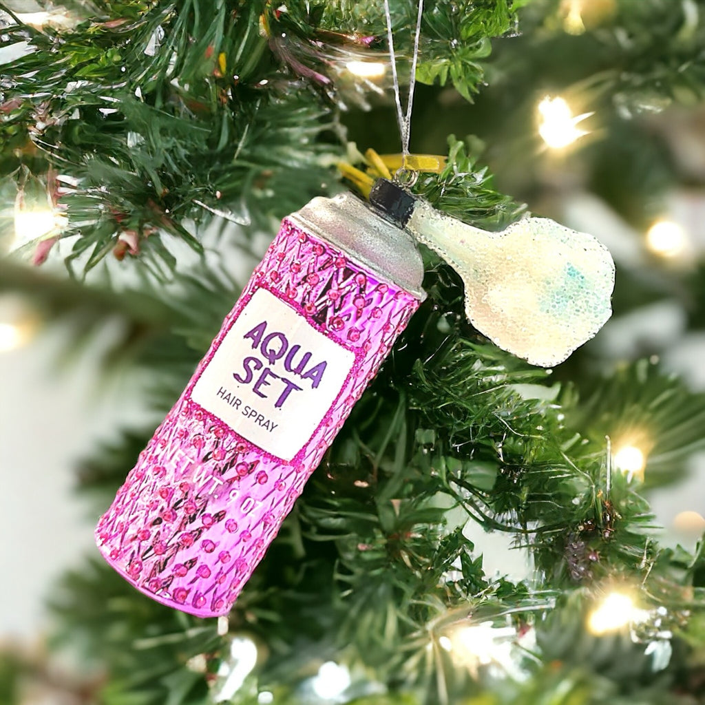 Retro-inspired pink ornament resembling a hairspray bottle, perfect for a unique and festive tree decoration.