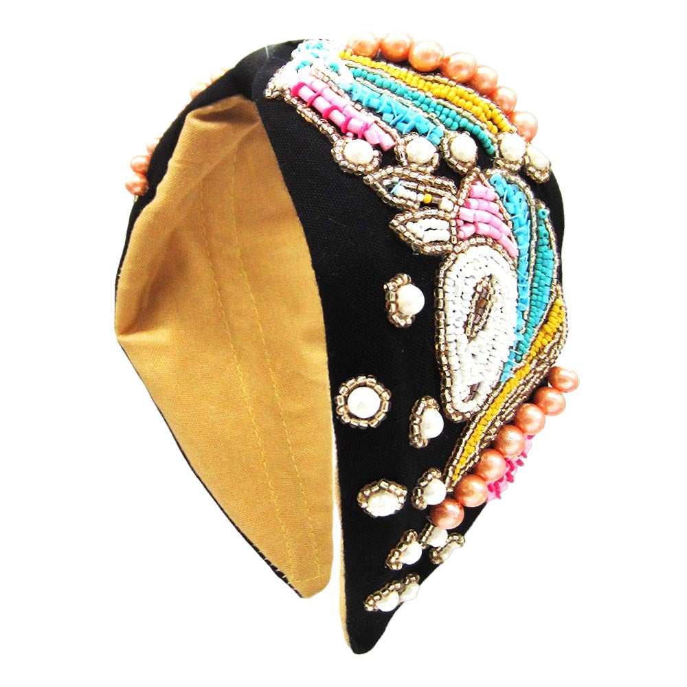 Black headband with colorful jewel embellishments and sparkly beadwork, perfect for parties and special events.