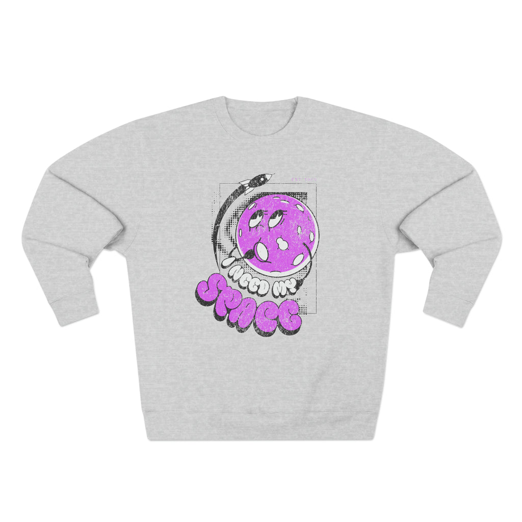 Gray crew neck sweatshirt with a playful "I Need My Space" graphic, made from warm and durable fleece material.