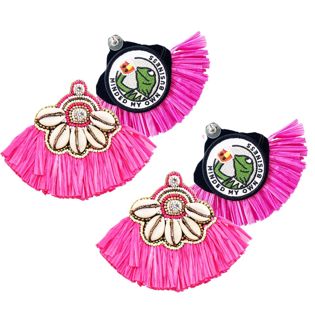 Fuchsia fringe earrings with cowrie shells and rhinestone detail, perfect for a tropical vacation or beach outing.