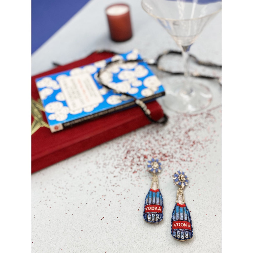 Quirky vodka bottle earrings with intricate beadwork and a "Love and Peace" patch, designed for playful and bold styles.