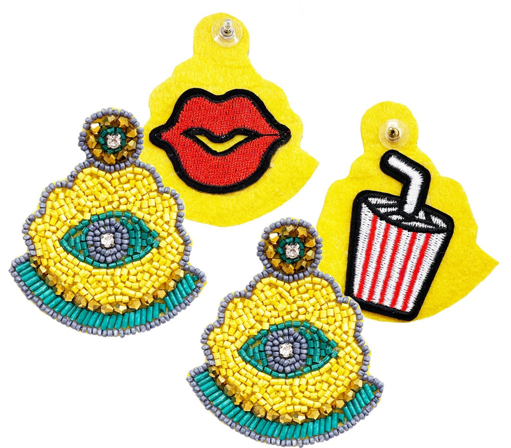 Bold yellow and green beaded earrings with an artistic "Milkshake Kiss" patch, inspired by Indian sculptural design.