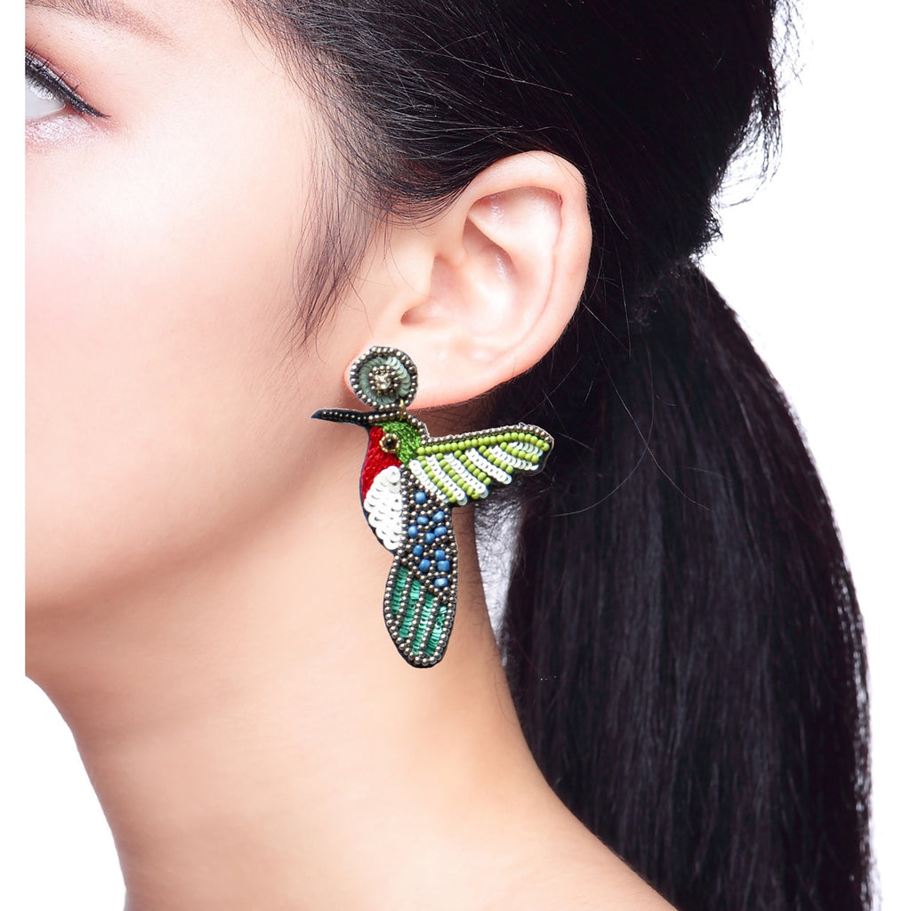 Handcrafted beaded earrings inspired by the beauty of hummingbirds, featuring a lightweight design with a "Peace and Love" patch.