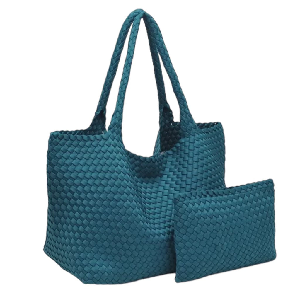 Trendy teal tote with a textured basketweave design, offering ample storage space and made from lightweight neoprene.