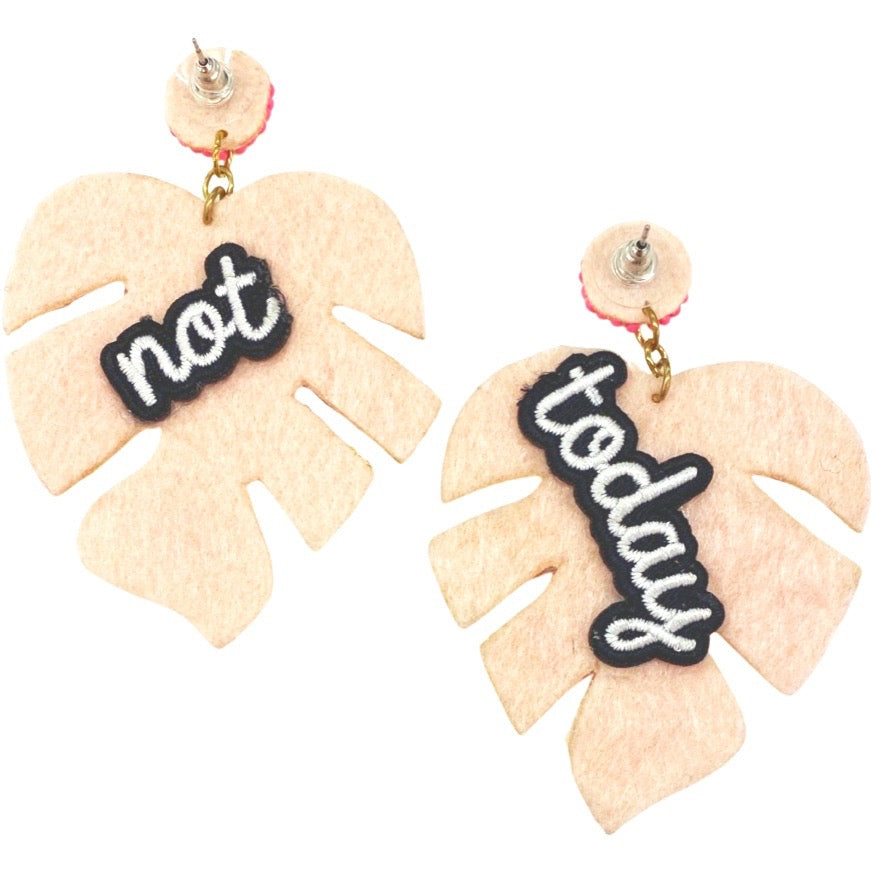 Handcrafted blush pink earrings in a leaf shape with Swarovski stones and "Not Today" patches.