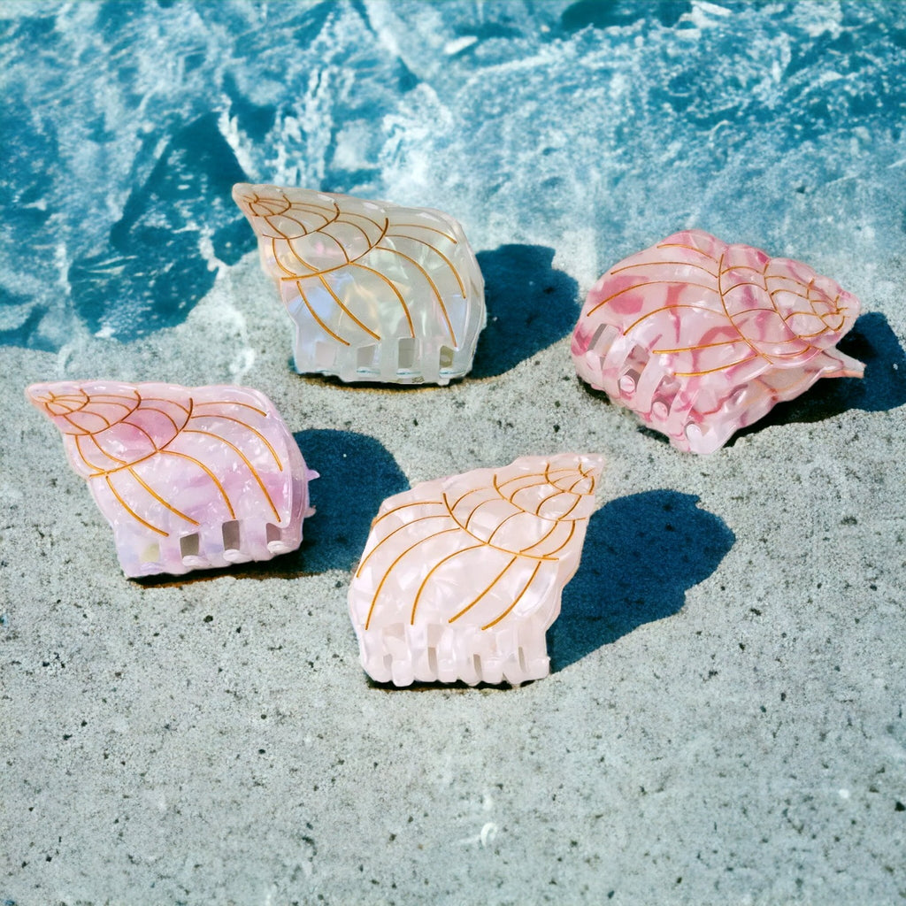 Beach-themed conch shell hair clips, adding a soft and elegant touch to your hairdo.