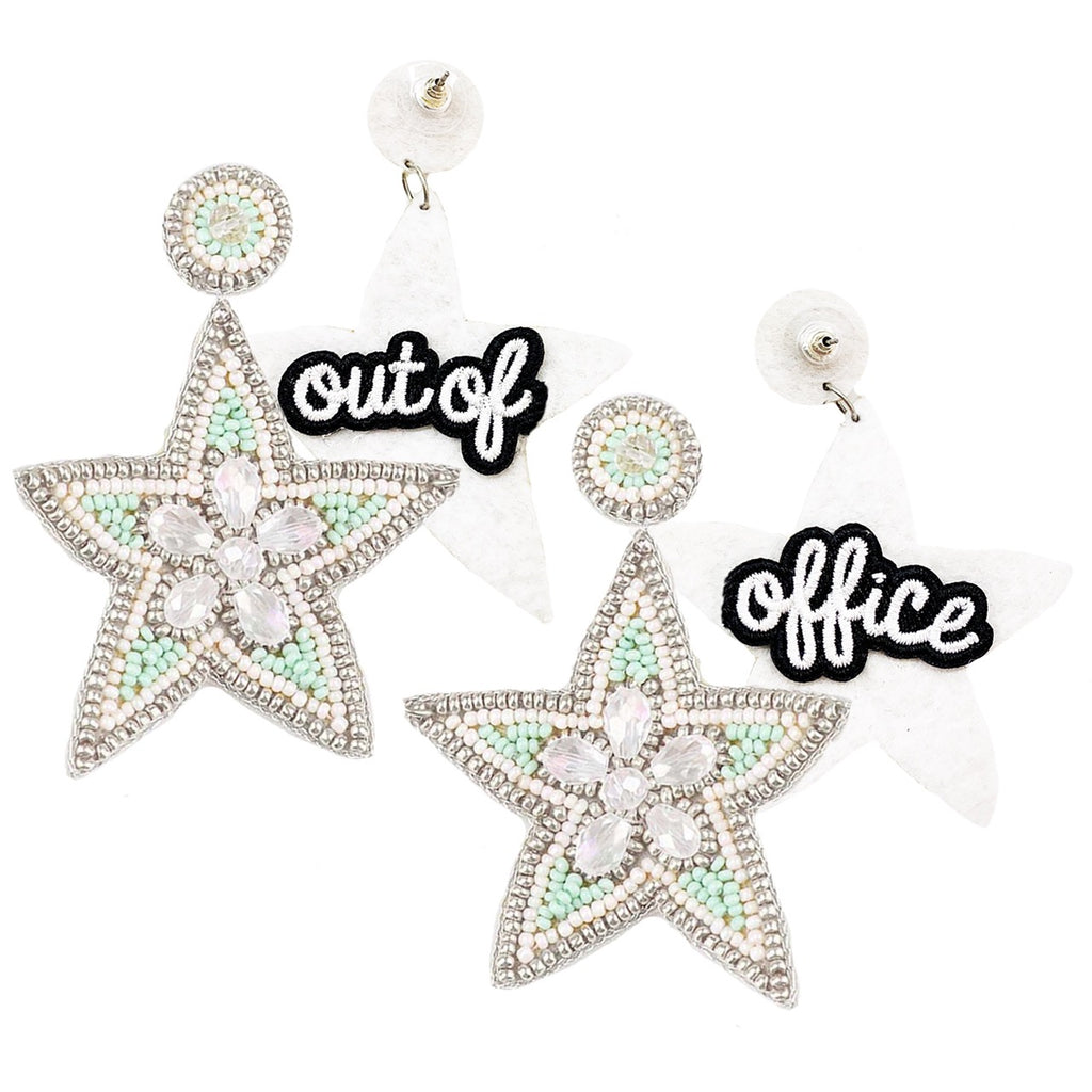 Star-shaped earrings with rhinestones and mint-colored beading, featuring an "Out of Office" patch on the back.