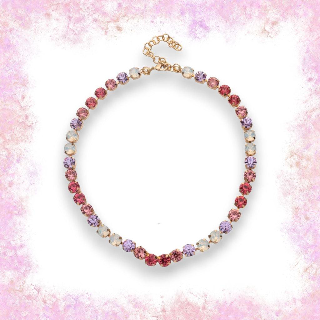 Eye-catching necklace adorned with beautiful purple and pink gemstones, a unique and stylish accessory for those who appreciate natural beauty.