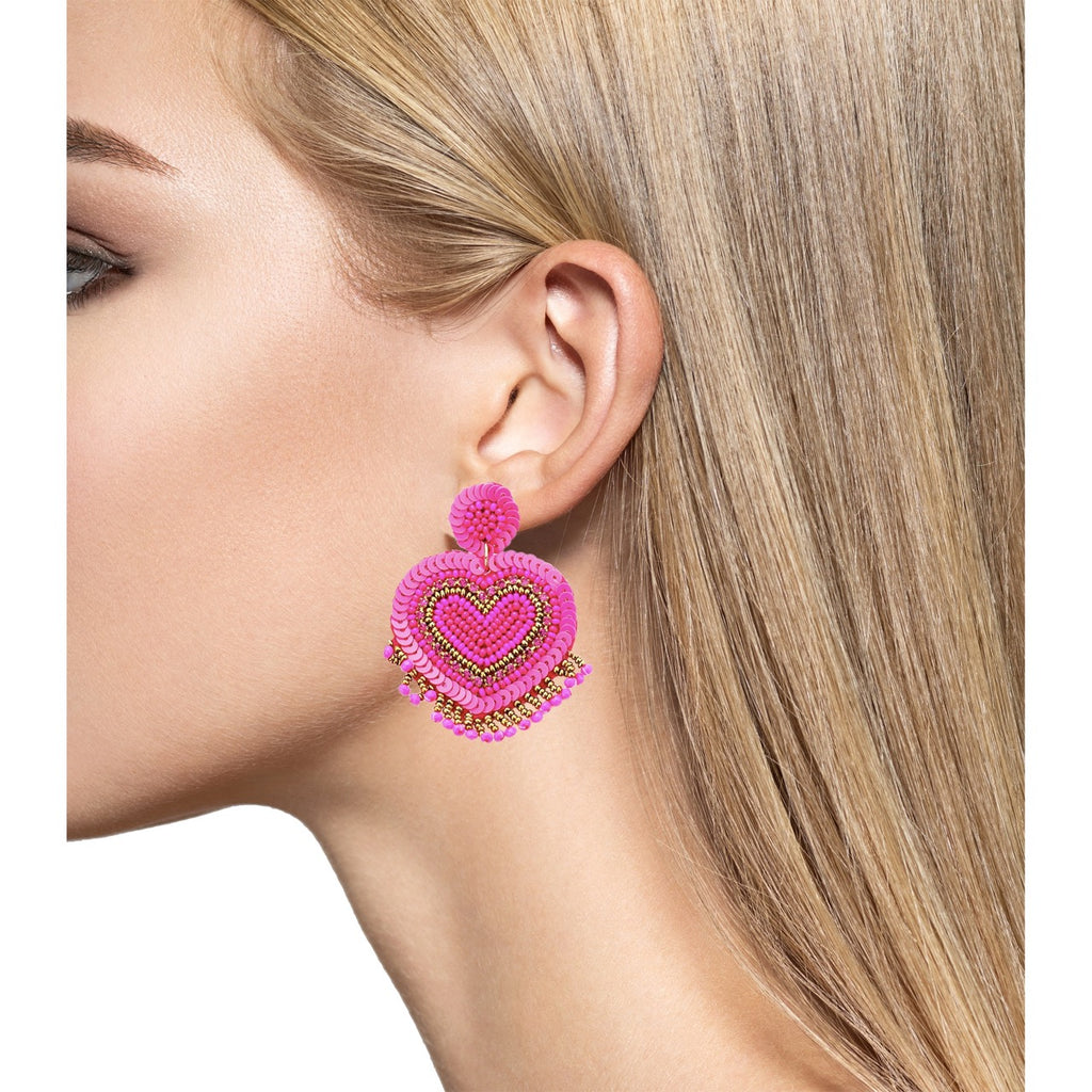 Heartbreaker earrings in vibrant fuchsia with BAM! and Kaboom patches, ideal for a unique statement.