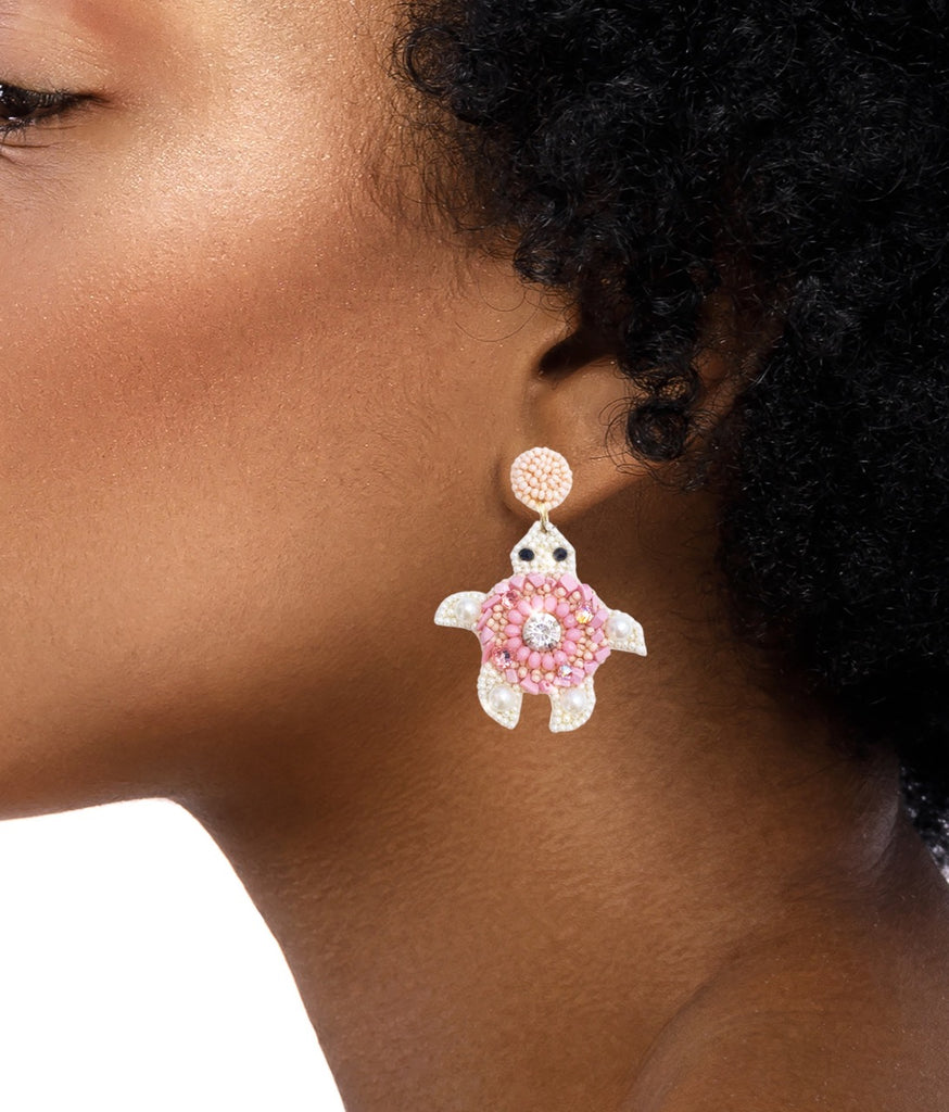 Cute Pink Turtle Earrings with intricate beading and a cheeky "Nope" patch, designed for lightweight comfort and versatility.