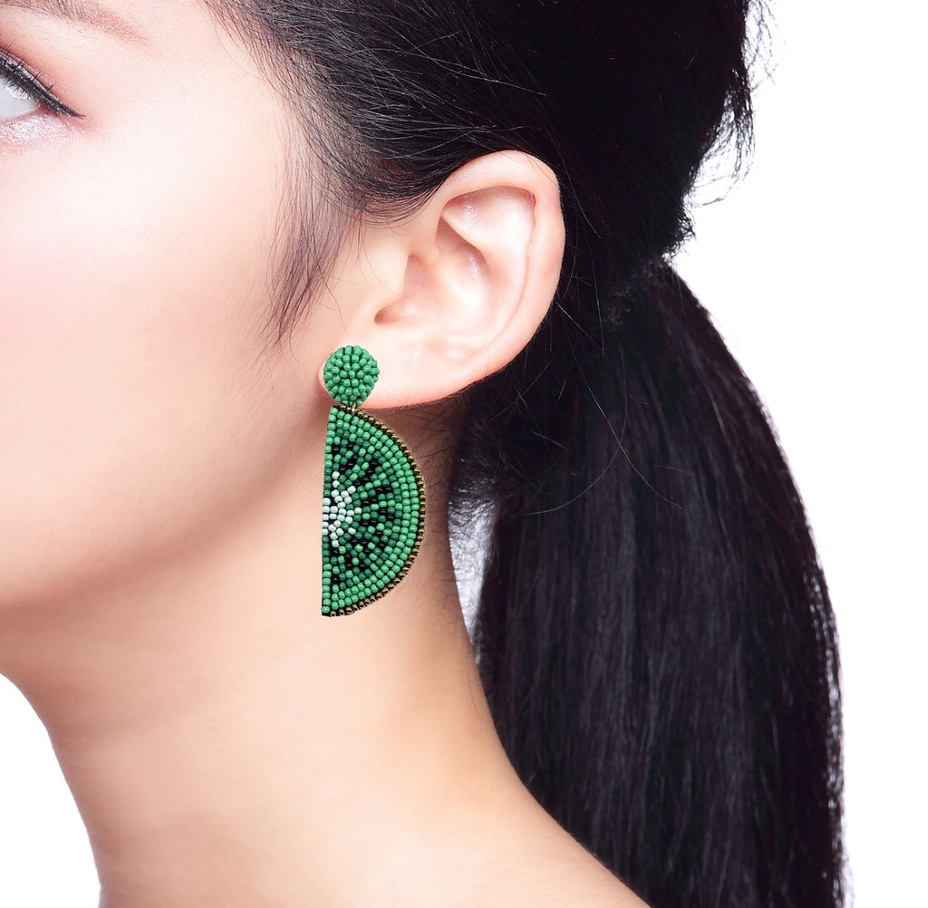 Kiwi Earrings featuring vibrant beaded details and a quirky "OMG!!" patch, perfect for tropical summer vibes.