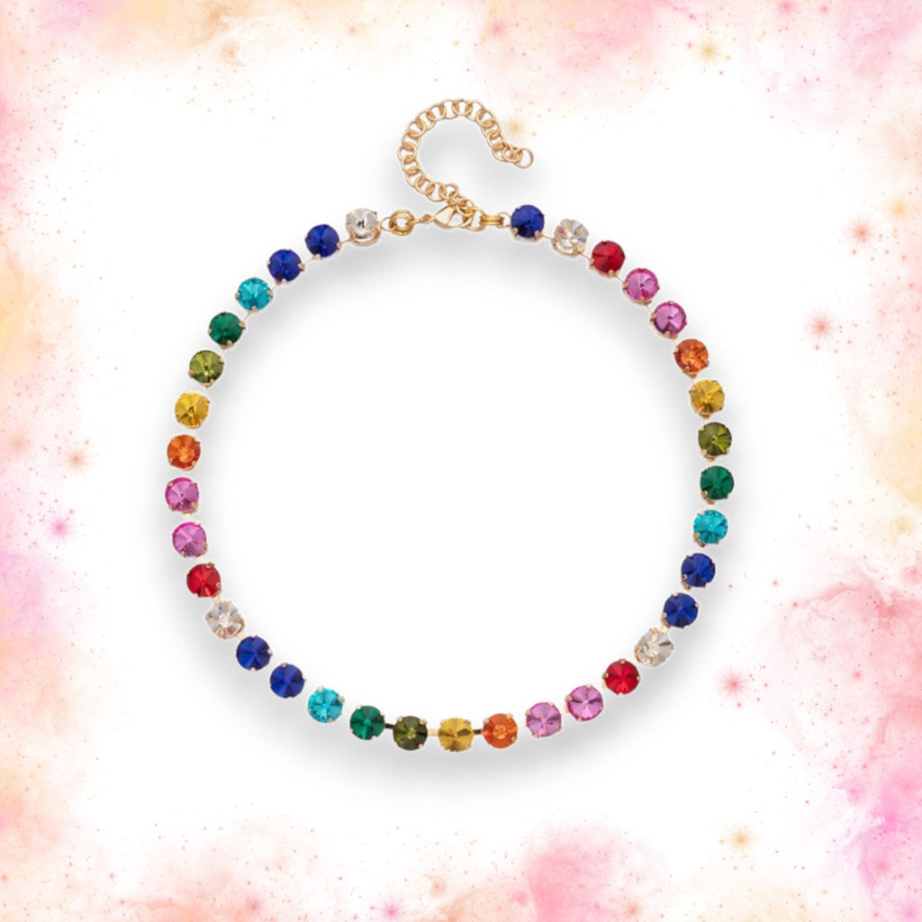 Vibrant crystal gemstone and rainbow bead necklace boasting a unique blend of colors and textures, designed to elevate any ensemble with a touch of bohemian flair.