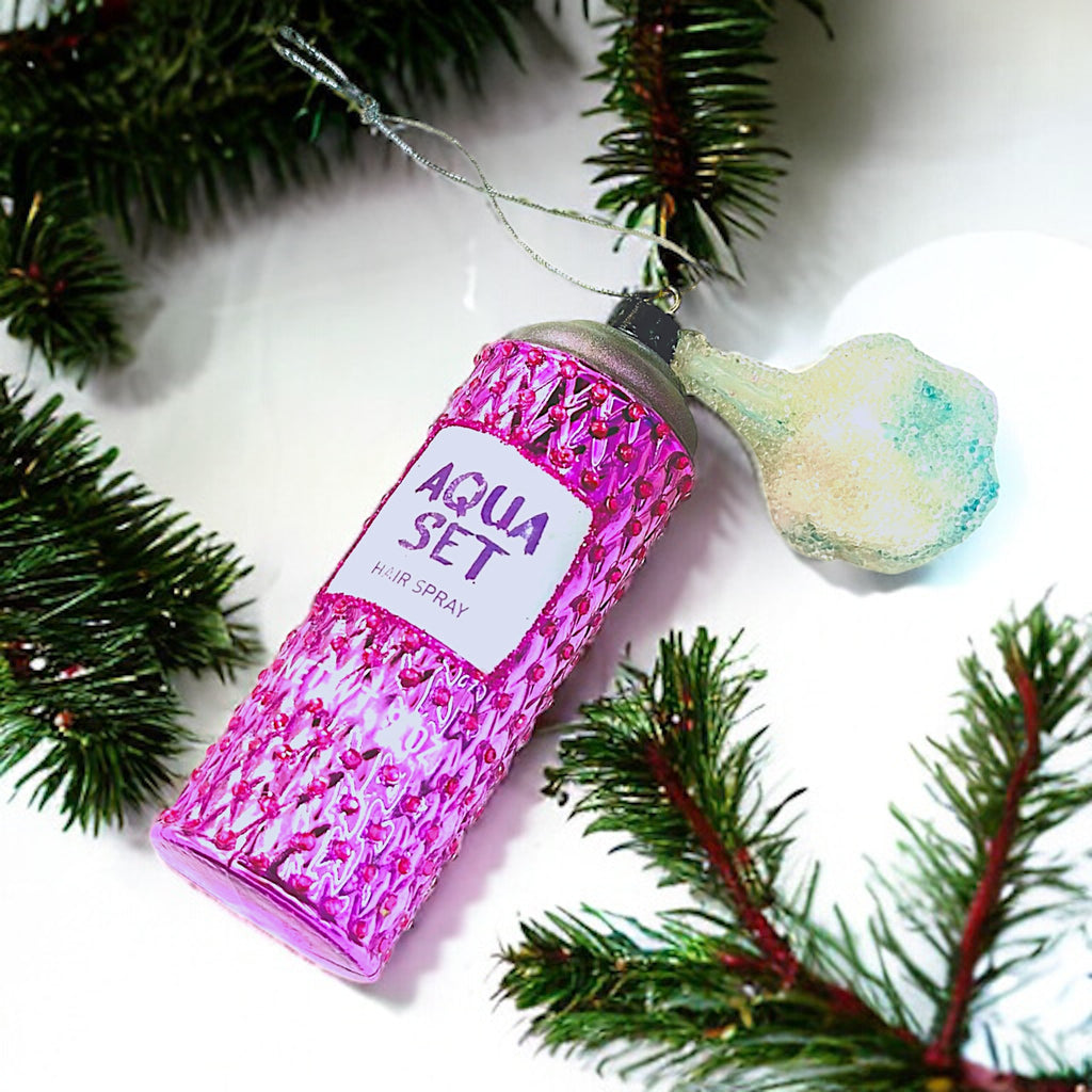 Pink glitter hairspray ornament inspired by retro bottles, perfect for adding a fun and glamorous touch to your Christmas tree.