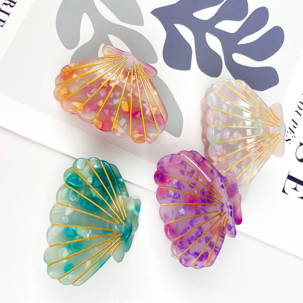 Colorful ocean-inspired hair clip with accents.