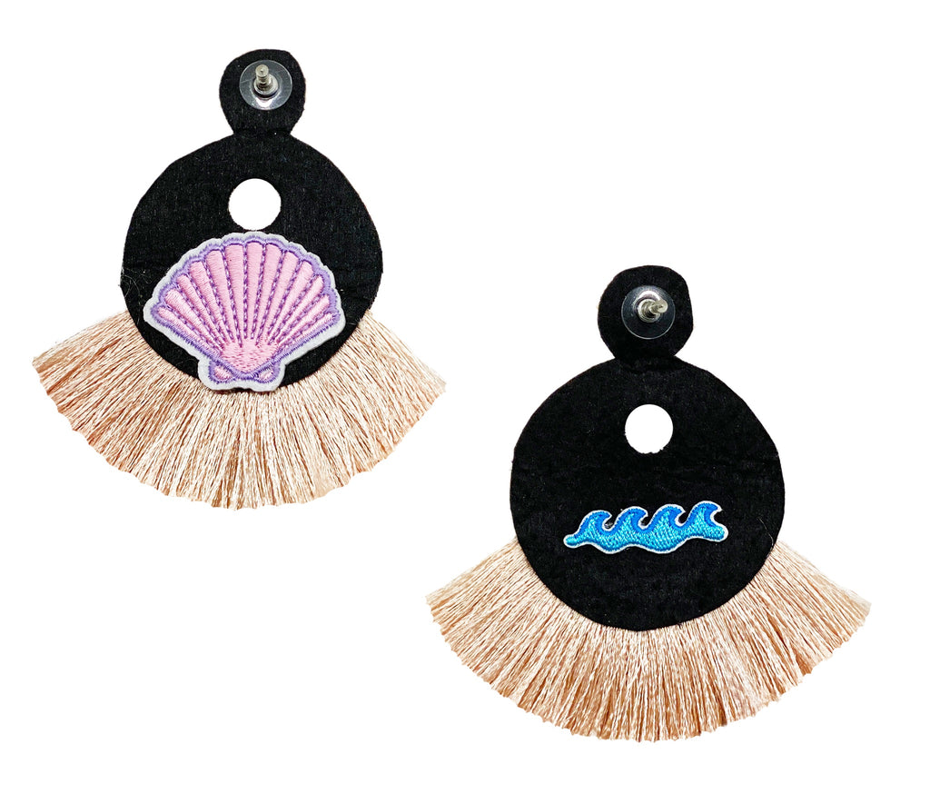 Handcrafted nude fringe earrings with ethnic beadwork and playful seascape accents.