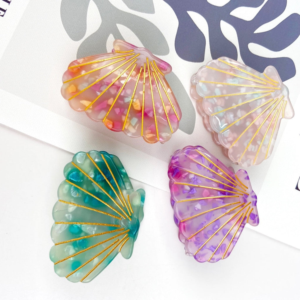 Handcrafted shell-shaped hair accessory for women.