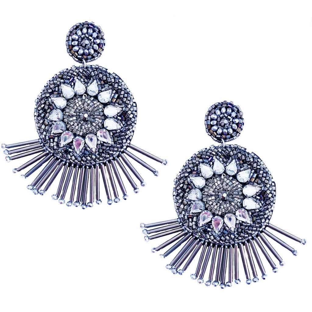 Sparkly crystal silver earrings featuring a firework-inspired design with delicate beading and fringe.