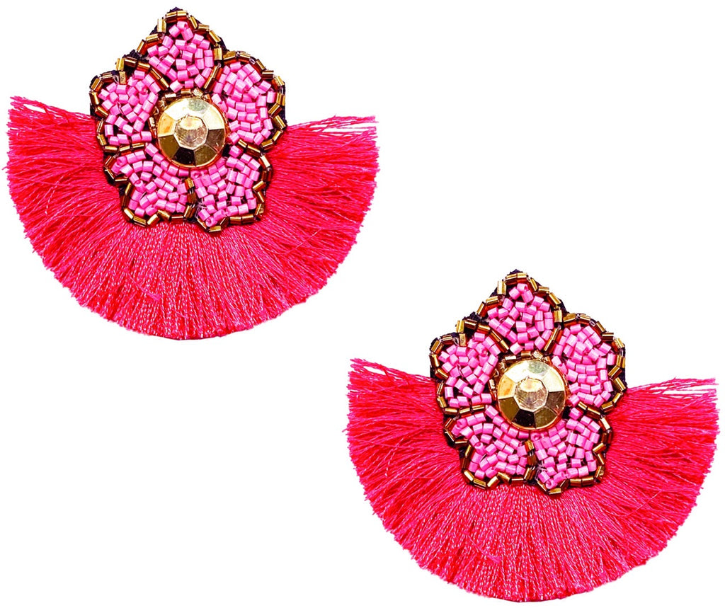 Handcrafted fuchsia earrings with a bold fringe and quirky patch design, ideal for chic, spring-ready looks.