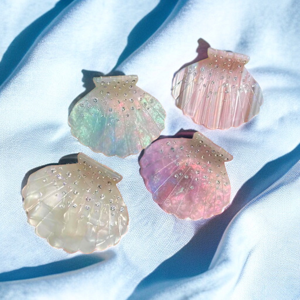 Shell hair clips with an iridescent glow, perfect for adding a unique flair to any hairstyle.