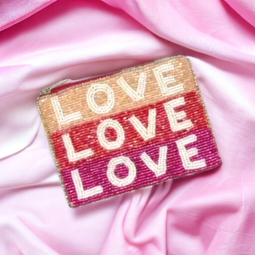 Charming beaded coin pouch with "LOVE" pattern, ideal for adding a touch of affection to your style.