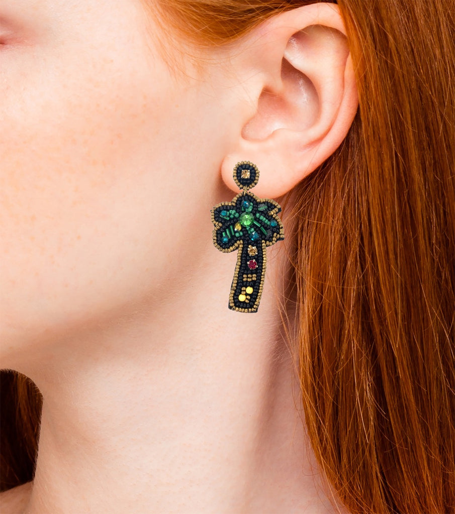 Crystal-adorned Palm Tree earrings featuring a quirky "Hi / Bye" patch, adding tropical flair to any outfit.