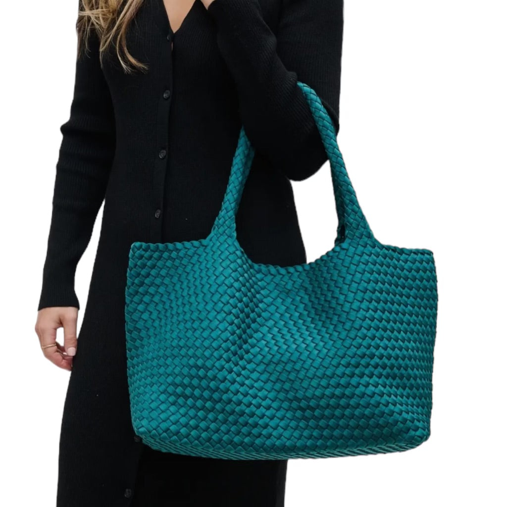 Large teal tote bag with a basketweave texture, crafted from durable neoprene, perfect for the beach or picnics.