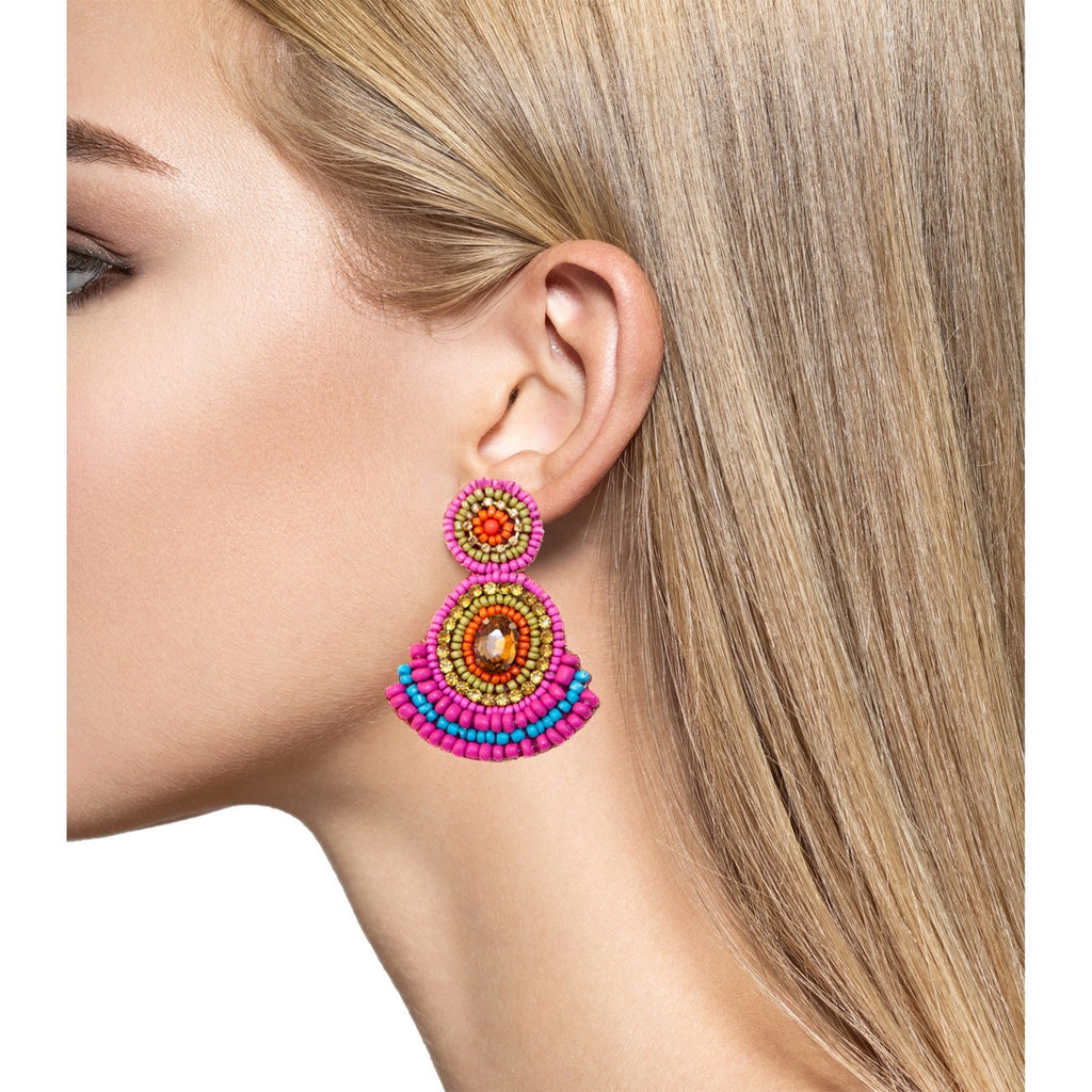 Hypoallergenic pink earrings with a bold and fierce design, ideal for standing out.