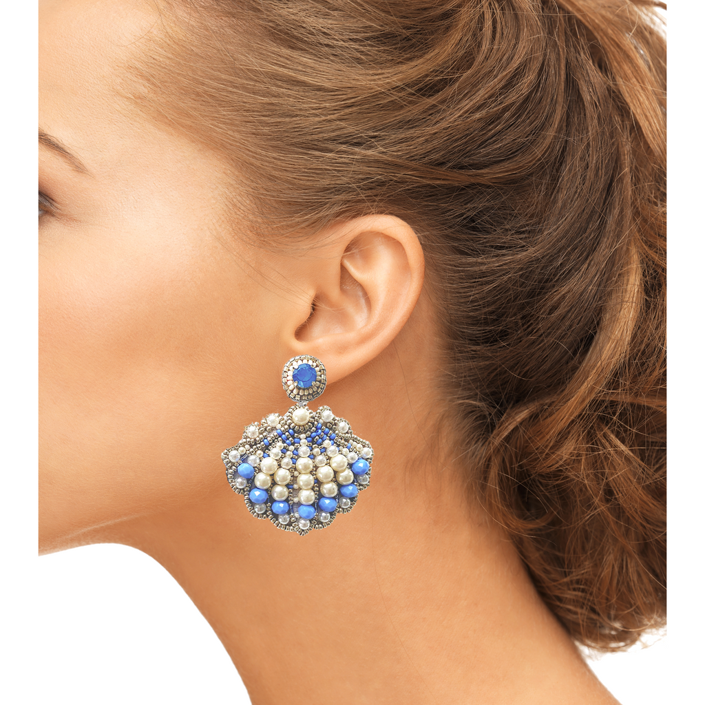 Fashionable beaded shell earrings with blue and white beads and hypoallergenic material.