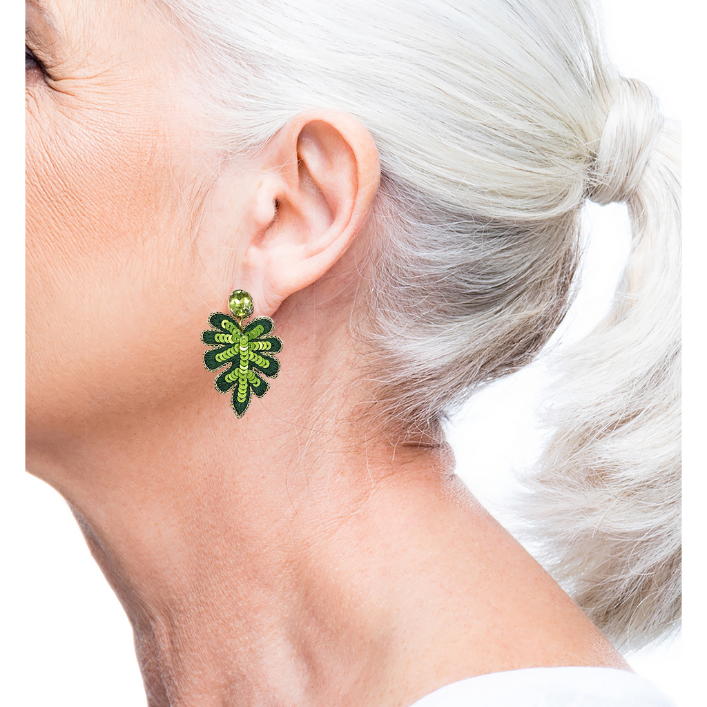 Trendy green leaf earrings with a fun patch design and lightweight construction.