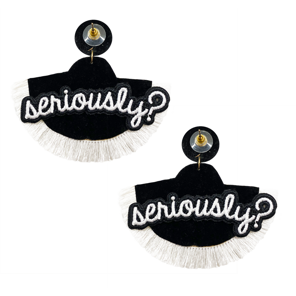 Elegant handmade earrings with an ivory fan silhouette and "Seriously?" patch detail.